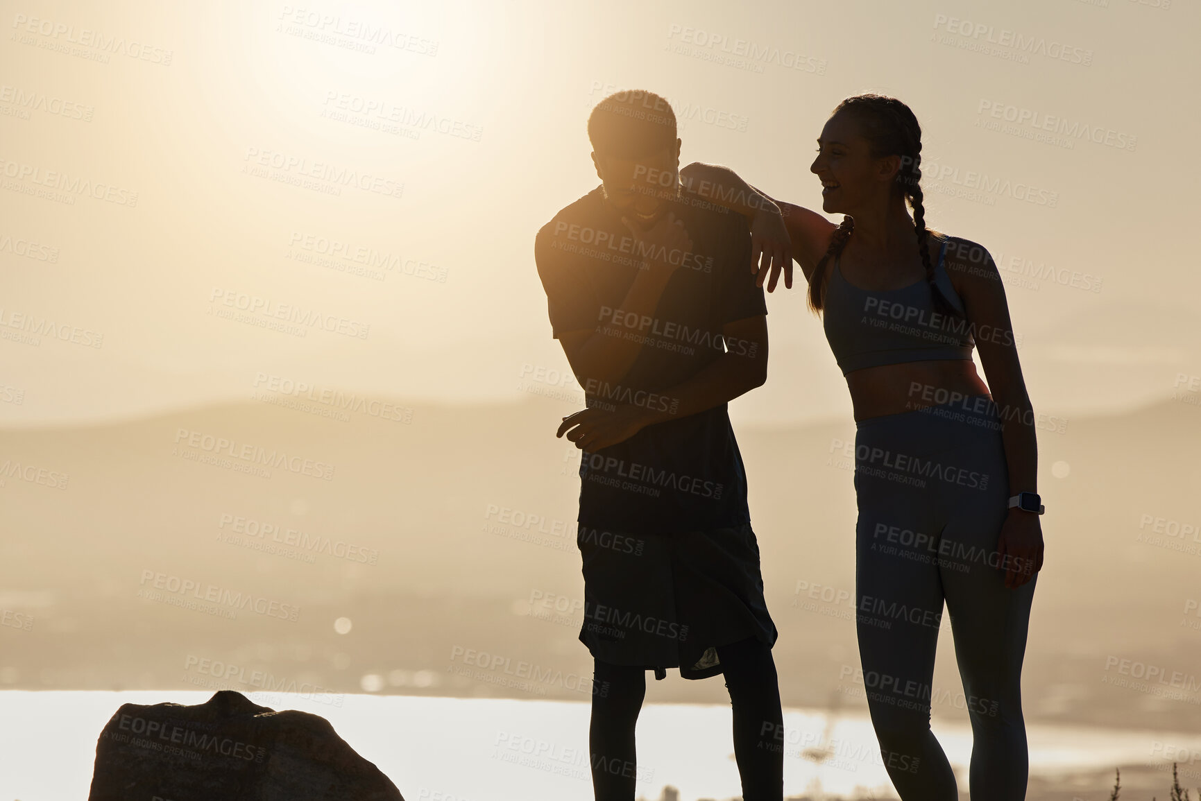 Buy stock photo Fitness, silhouette and couple talking in nature on break after workout outdoors. Sunset, happy man and woman discussing goals, training or target together after running or exercising for wellness.