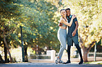 Workout, couple and hug in park portrait for exercise, fitness and walk break with smile for affection. Interracial, love and wellness of happy people dating on cardio rest together in New York.