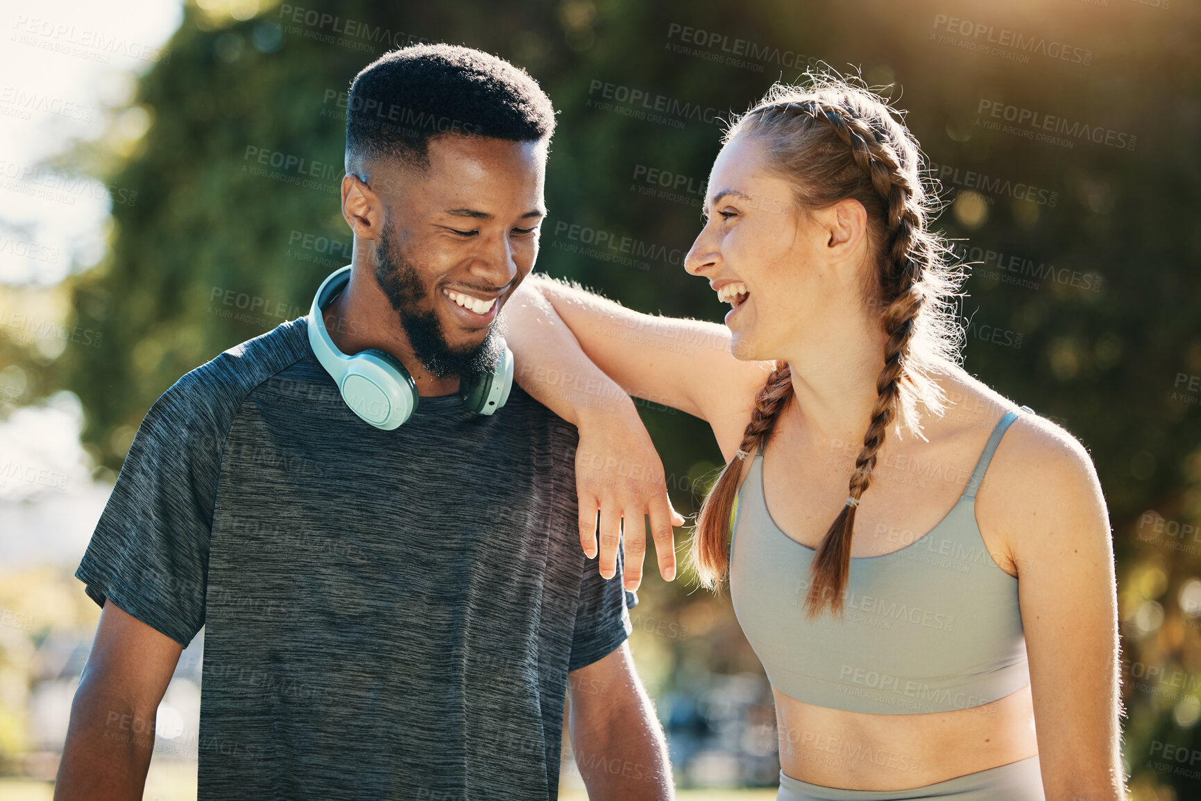 Buy stock photo Fitness, laugh and fun with a diversity couple outdoor for exercise together in a park during summer. Sports, workout and training with a man and woman runner outside for health, cardio or endurance