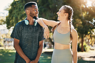 Buy stock photo Fitness, couple and talking in nature after running, workout or exercise. Diversity, happy man and woman in discussion on break after training or exercising for wellness, health or healthcare at park