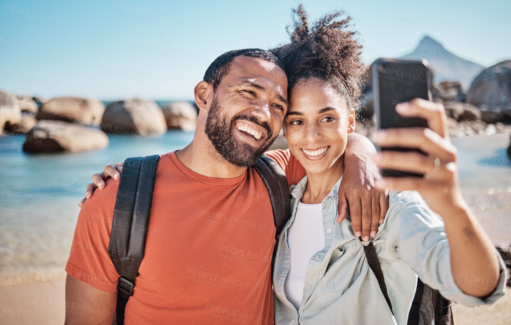 Buy stock photo Couple, phone selfie and beach travel adventure together for social media, holiday vacation and summer in nature. Man, happy woman and hug for mobile phone photograph at ocean sea for happiness