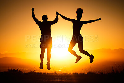 Buy stock photo Sunset, jump and view with a sports couple outdoor in nature for a workout, fitness or exercise together. Silhouette, motivation and health with a man and woman jumping in celebration of a goal