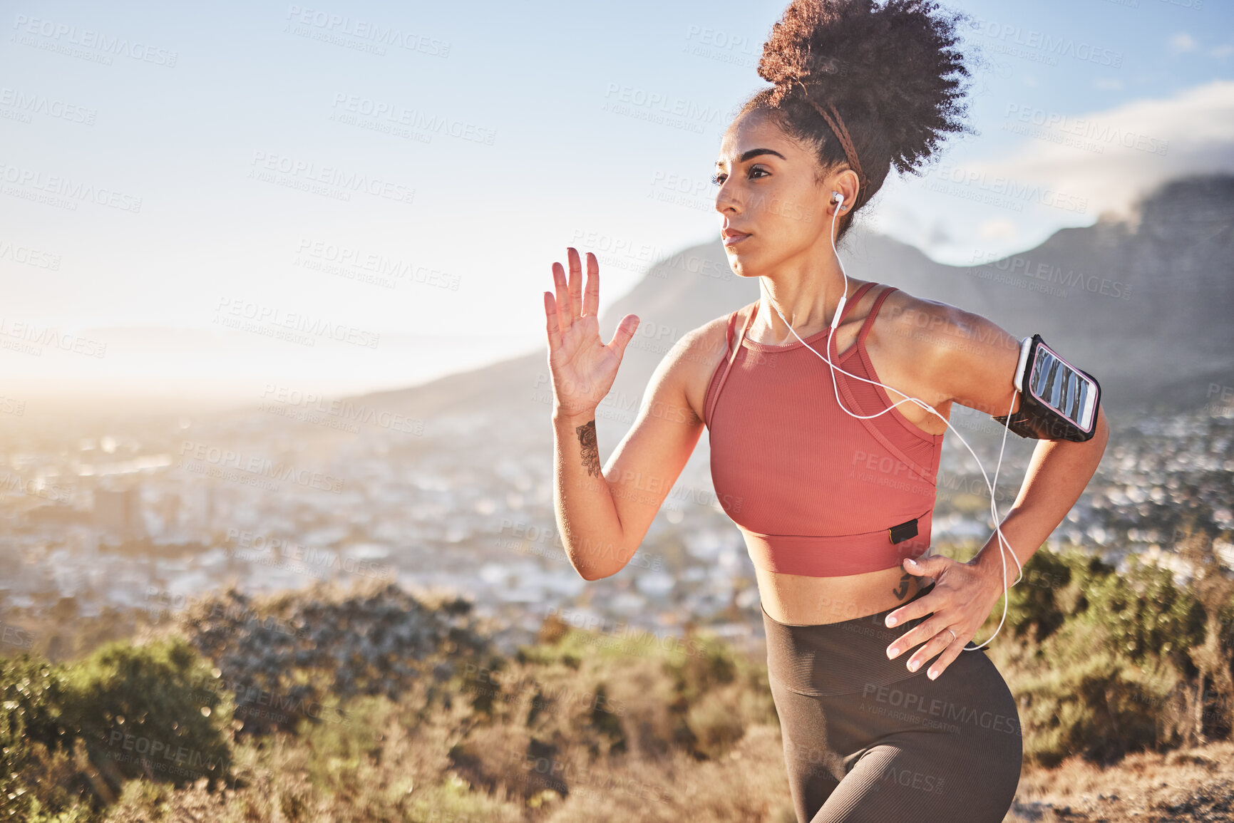 Buy stock photo Fitness, music and mountain with black woman running with phone for health, training and sports. Streaming, technology and mobile with girl runner for exercise, freedom and workout in nature