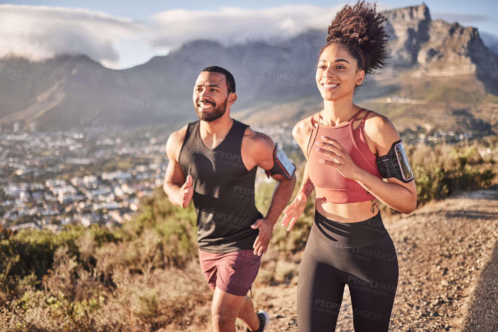 Buy stock photo Fitness, exercise and couple running on mountain together for healthy body, wellness and workout. Motivation, nature and black man and woman exercising, doing workout and marathon training in city