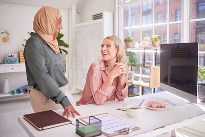 Buy stock photo Business people, office and women talking at desk, chatting or discussion. Meeting, communication and happy manager in casual conversation with employee or colleague on break at company workplace.