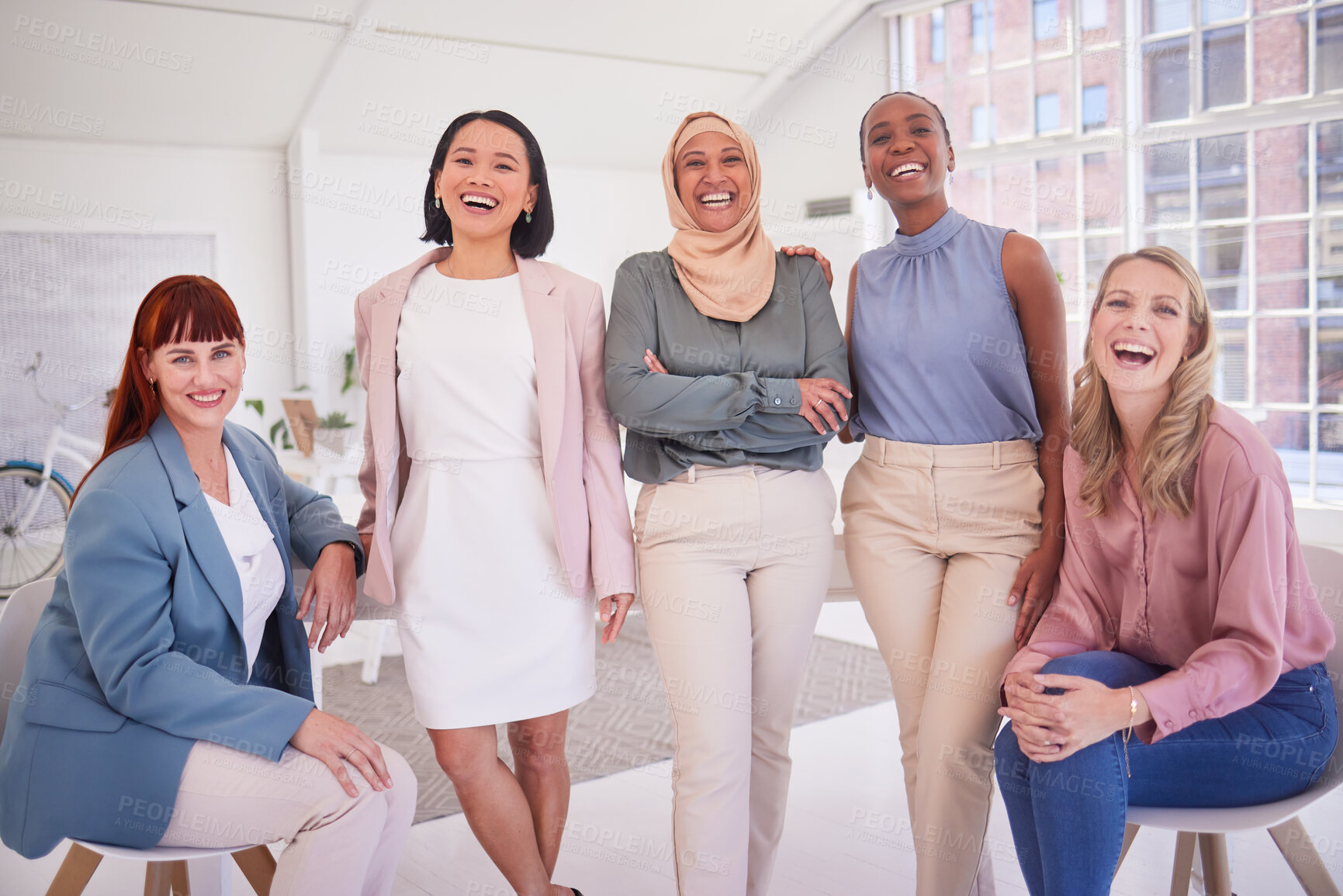 Buy stock photo Diversity, women and portrait of a team in the office in meeting, team building or project planning. Happiness, collaboration and work friends standing together in their coworking space in workplace.