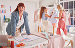 Fashion, design and portrait of business woman and team for design, idea and creative collaboration in studio. Leader, fashion designer and businesswoman planning, thinking and working in a workshop