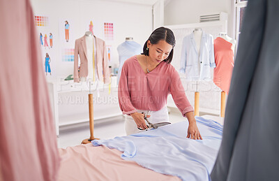 Buy stock photo Designer, fabric and cutting in studio for asian woman in workshop, small business or job with scissors. Creative woman, startup or tailor with design, clothes or vision for couture, fashion or style