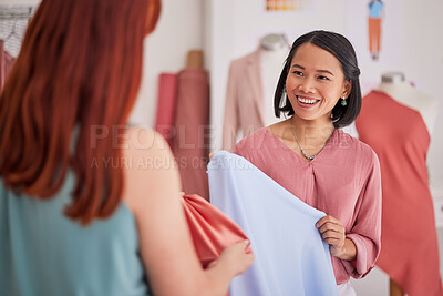 Buy stock photo Fashion, retail and customer shopping for clothing at a boutique with friendly asian woman, happy and relax. Sale, fabric and client consulting with shop owner for discount, choice and style in Tokyo