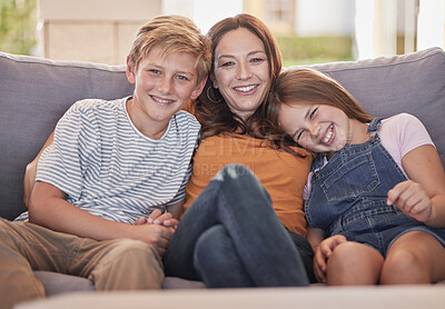 Buy stock photo Portrait of mom, children relax and smile on sofa together bonding, love and care in living room at family home. Boy kid, girl child and a happy mother hug kids on couch in lounge with young siblings