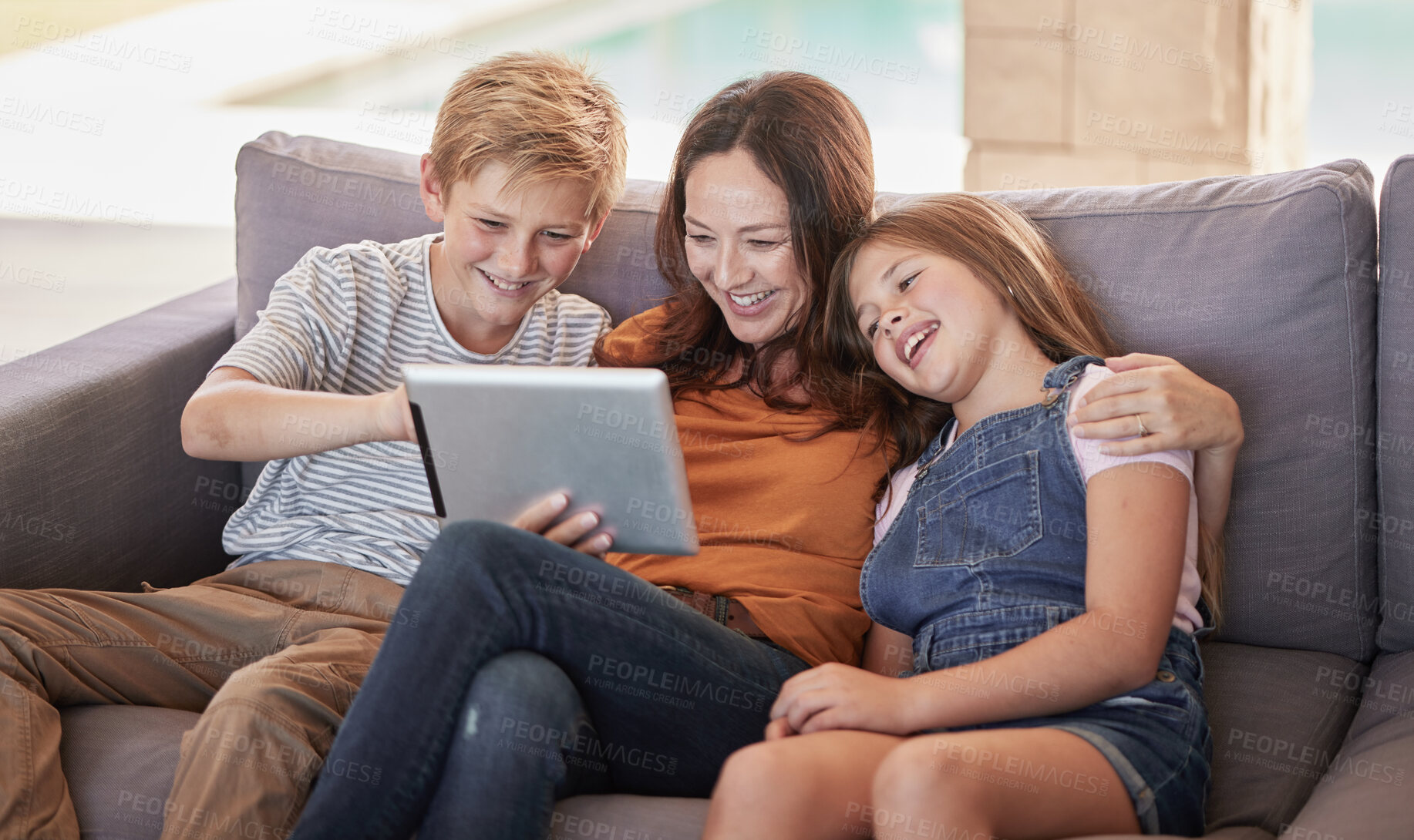 Buy stock photo Relax, happy and tablet with mother and children on sofa for streaming, internet and social media app. Smile, subscription and movies with mom and kids in living room for family home for cartoon
