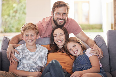 Buy stock photo Family, hug and living room sofa with a mother, father and children smile with parent love and care. Portrait of a dad, mom and kids with happiness bonding at home together relax in a lounge