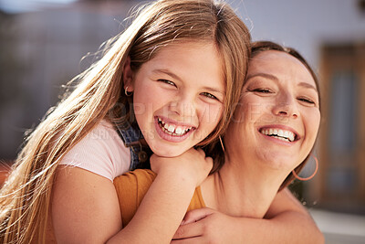 Buy stock photo Happy, smile and portrait of a mother and child bonding, embracing and playing together at their house. Happiness, love and young girl kid hugging mom with loving, positive and caring embrace at home