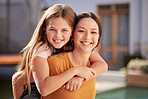 Girl, mom and piggy back with smile in portrait in home garden, backyard or sunshine together for fun. Mother, child and carrying on back for hug, love or bonding outdoor with smile, happy and summer