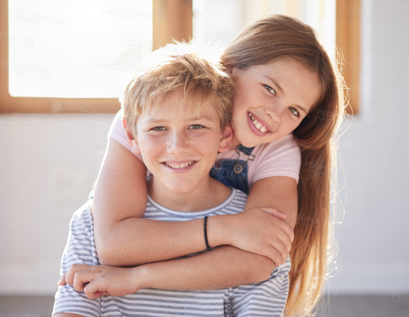 Buy stock photo Family, hug and portrait of girl an boy in a living room, bonding and happy while enjoying quality time together. Face, happy family and sibling brother and sister embrace, playful and relax at home