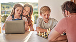 Family, parents and kids with laptop, chess and learning together in home for fun, education and bonding. Dad, children and board games for mind, strategy and development with pc, mother and daughter