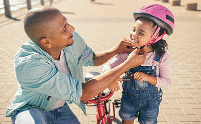 Buy stock photo Father, child and safety helmet while outdoor with bicycle on the promenade for fun and quality time while learning to ride a bike. Man and girl family together for training and development in summer