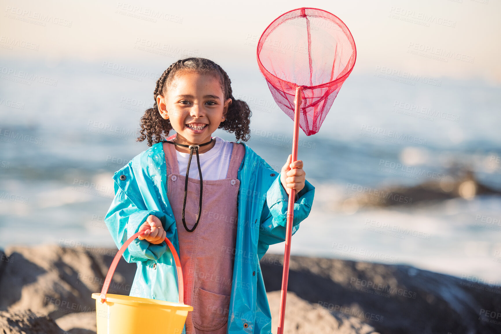 Buy stock photo Fishing, beach and girl excited for adventure, freedom and holiday by the ocean in Australia. Equipment, happy and portrait of a child with smile to catch fish by the ocean during a vacation