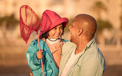 Buy stock photo Father, fishing and child on beach for freedom, love and learning to fish in summer together. Excited kid, happy family and teaching girl with fishing net on holiday adventure or vacation outdoor