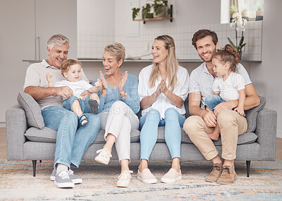 Buy stock photo Big family, grandparents and children on sofa in living room for holiday, baby language communication learning and love together. Happy, senior people with mother, father and kids on couch bonding