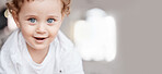 Family, portrait and face of baby boy learning to crawl on living room floor with cute, adorable and sweet smile. Love, relax and young kid smiling in family home for child care, wellness and health