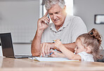 Phone call, senior man and girl at a table, working, remote and multitasking while drawing, bonding and checking email.  Elderly businessman freelancing while enjoying a fun activity with grandchild