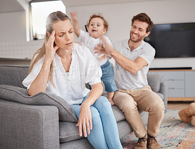 Buy stock photo Family, stress and headache of mother on sofa with father, hyper active energy and adhd child. Tired, burnout and woman in living room with boy and dad feeling depression or anxiety in home with kid.