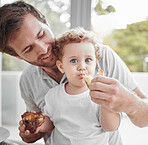 Meal, father and baby eat lunch with smile, love and happy together in Germany. Portrait, food and child eating bread for nutrition, health and hungry on a lunch in dining room, house or family home