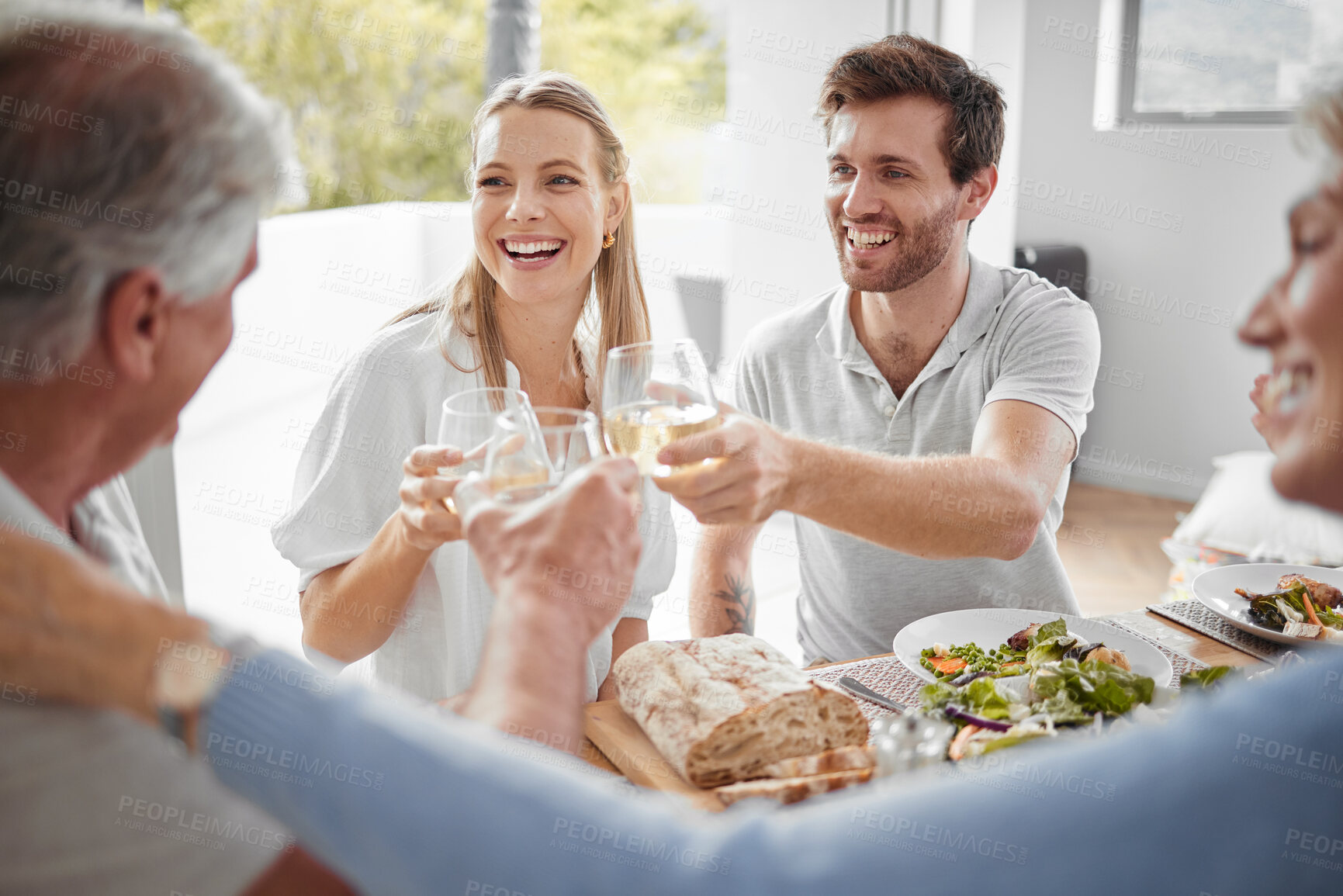 Buy stock photo Family toast, drink celebration or birthday lunch with smile, happy or love for birthday, achievement or success in home. Toast, alcohol and champagne in family home with man, woman or senior parents