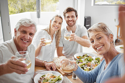 Buy stock photo Cheers, family selfie and dinner together at table for celebration, happiness and champagne. Happy family, celebrate retirement and eating healthy lunch, senior parents and toast for love and support