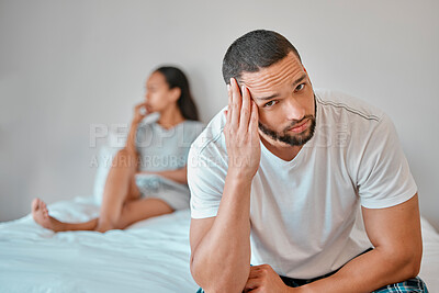 Buy stock photo Couple, divorce and stress in home bedroom, fighting or argument. Portrait, anxiety and unhappy man and woman, sad and depressed after infidelity, toxic relationship or failed marriage in house.
