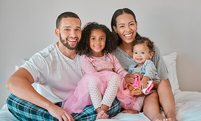 Buy stock photo Family, portrait and bedroom relax for bonding, love and care with girl children on the home bed. Mother, father and sisters or siblings bond with parents in loving relationship in childhood