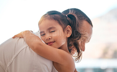 Buy stock photo Father, girl or bonding hug in support, love or security in house, family home or adoption center. Smile, happy child or kid embracing man, dad or parent in Indonesian children foster centre in trust