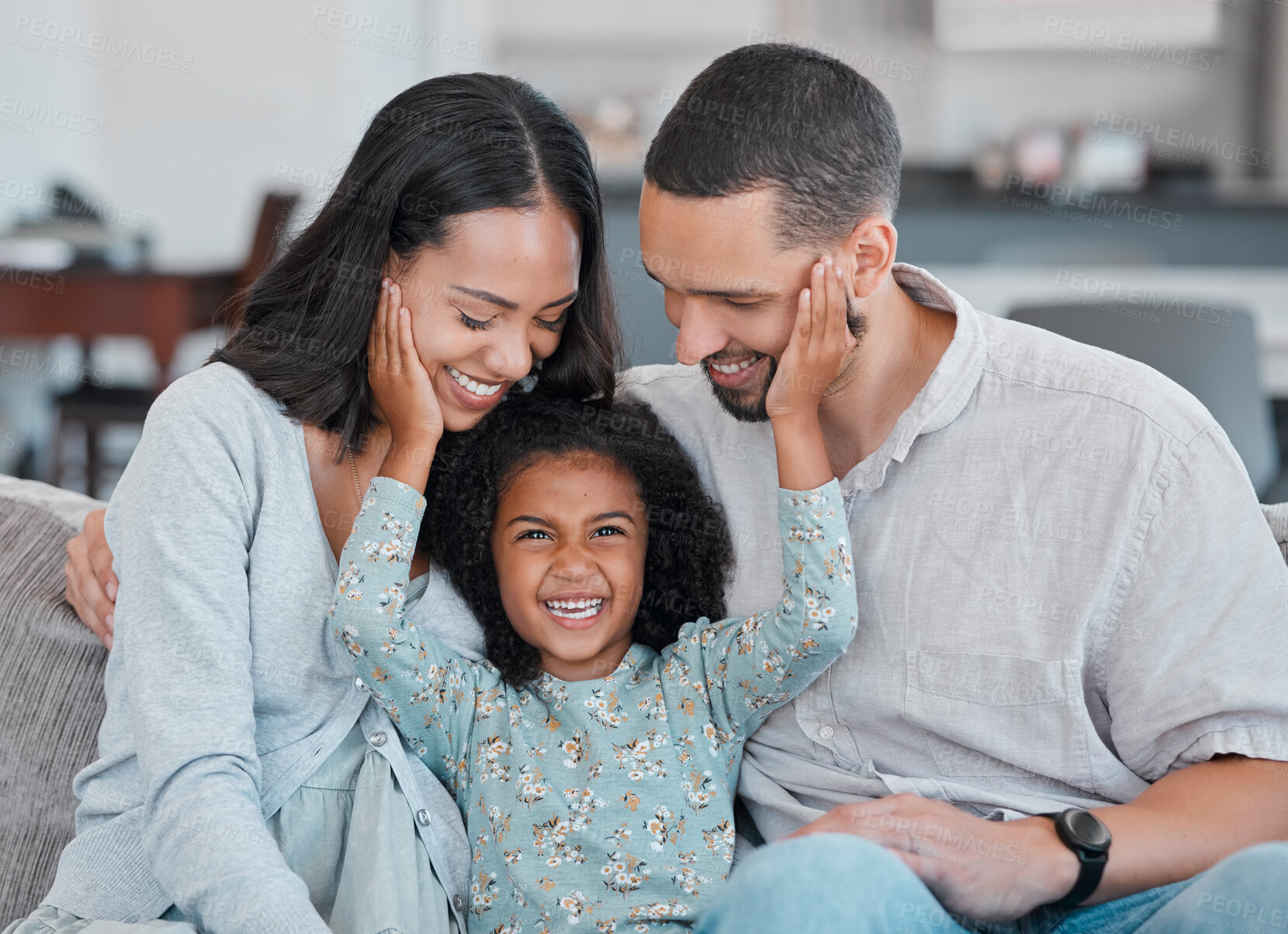 Buy stock photo Affection, happy and girl with love for parents, funny and care on the living room sofa in their house. Embrace, smile and girl with mother and father for quality time in their family home together