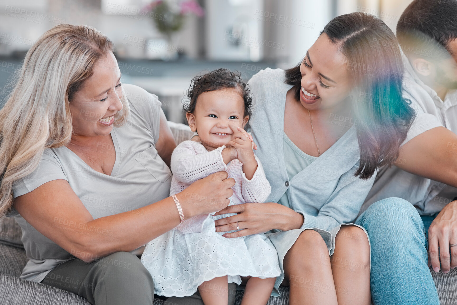 Buy stock photo Family, love and baby with a mother, grandmother and infant girl bonding on a sofa in the living room of a house. Mothers day, children and visit with a female toddler, woman and daughter at home