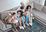 Happy family, children or parents bonding with senior grandparents on sofa in house or home living room. Top view, men or women with kids, girls and retirement elderly people together on lounge couch