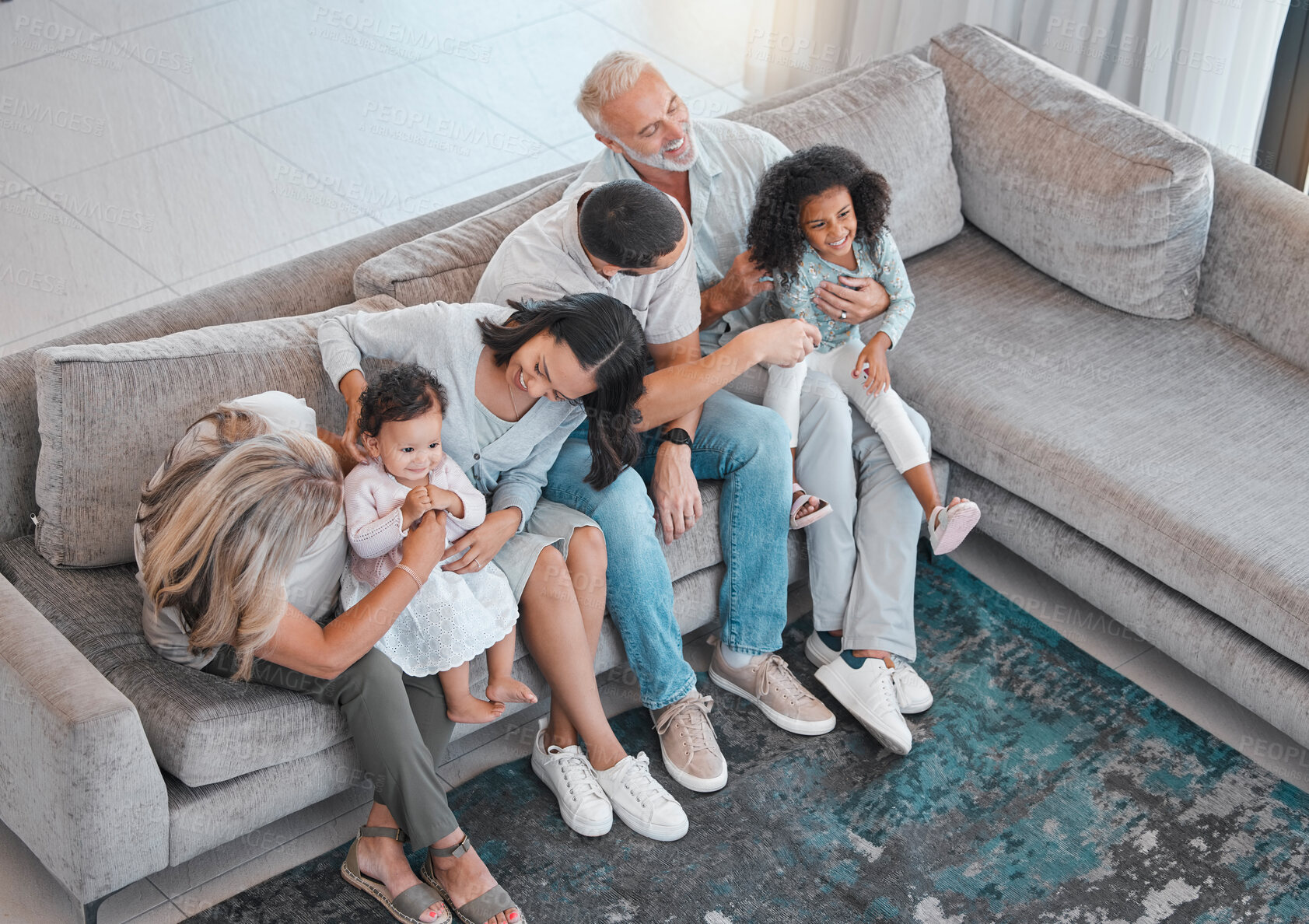 Buy stock photo Happy family, children or parents bonding with senior grandparents on sofa in house or home living room. Top view, men or women with kids, girls and retirement elderly people together on lounge couch