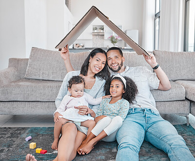 Buy stock photo Happy family with kids in living room of new family home, property and excited homeowners. Future, real estate and family security in home with mortgage for dad, mom and children with roof over head.