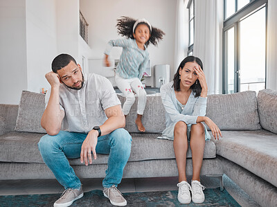 Buy stock photo Tired, couple and family with adhd girl jump fast on sofa in house living room or home. Man, woman and parents with burnout, depression or anxiety from autism, energy and mental health kid and stress