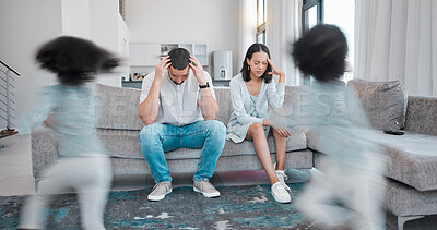 Buy stock photo Mother, father and stress in burnout with child busy running around in the living room annoying parents on sofa at home. Tired mom and dad suffering in depression, anxiety or headache from noisy kids