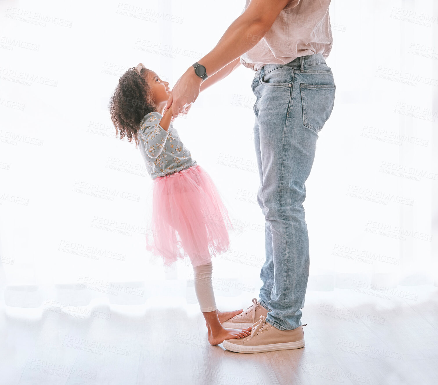 Buy stock photo Father, child and dance in ballet tutu for fun, bonding and artistic expression with love and care in childhood. Dancer, dancing and man with daughter having fun in the family home being playful