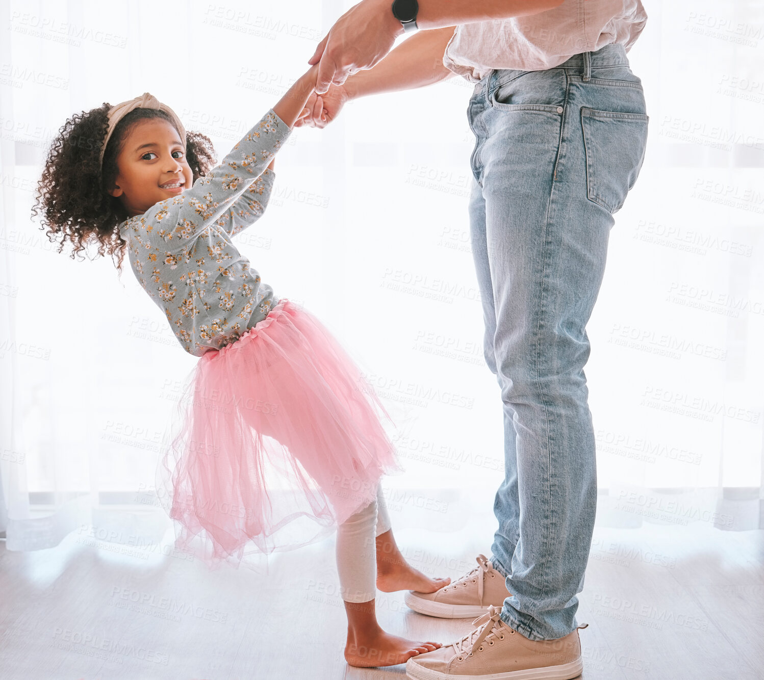 Buy stock photo Happy, dance and girl with father dancing in a living room, love, family and fun in their home together. Portrait, family and parent teaching child dancer, love, caring and support by dad in house
