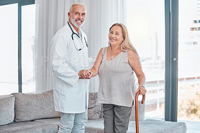 Buy stock photo Doctor, woman and walking stick in portrait for rehabilitation, healthcare or wellness in consultation room. Medic, physiotherapist and happy patient in hospital for help, physical therapy or support