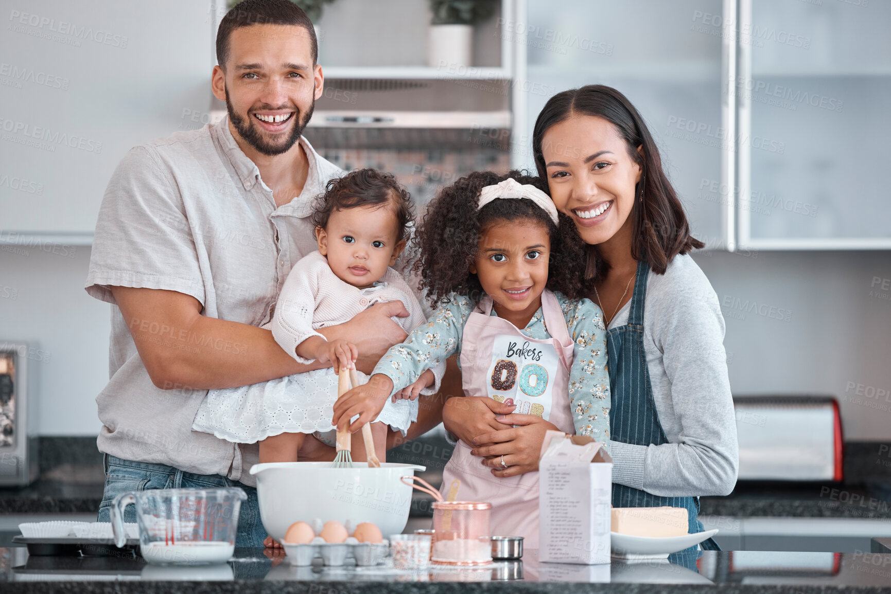 Buy stock photo Happy family, baking and learning while teaching girl to bake in kitchen counter, love and fun together in home. Dad, mom and girl kids or baby with food, ingredients and flour for breakfast in home