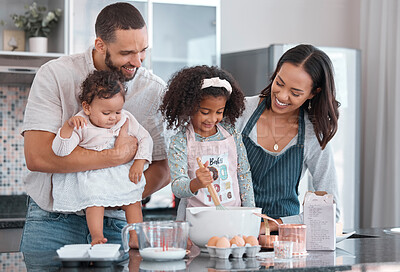 Buy stock photo Mother, father and children in kitchen baking with smile on face and help cooking together. Family, fun learning and teaching girl to bake, man and woman with happy kids family home in New Zealand.