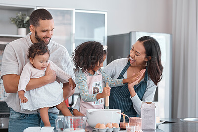 Buy stock photo Family, baking and cooking together with high five in home kitchen with children learning from mother and father to cook food, breakfast and pancakes or cake. Man, woman and kids helping make cookies