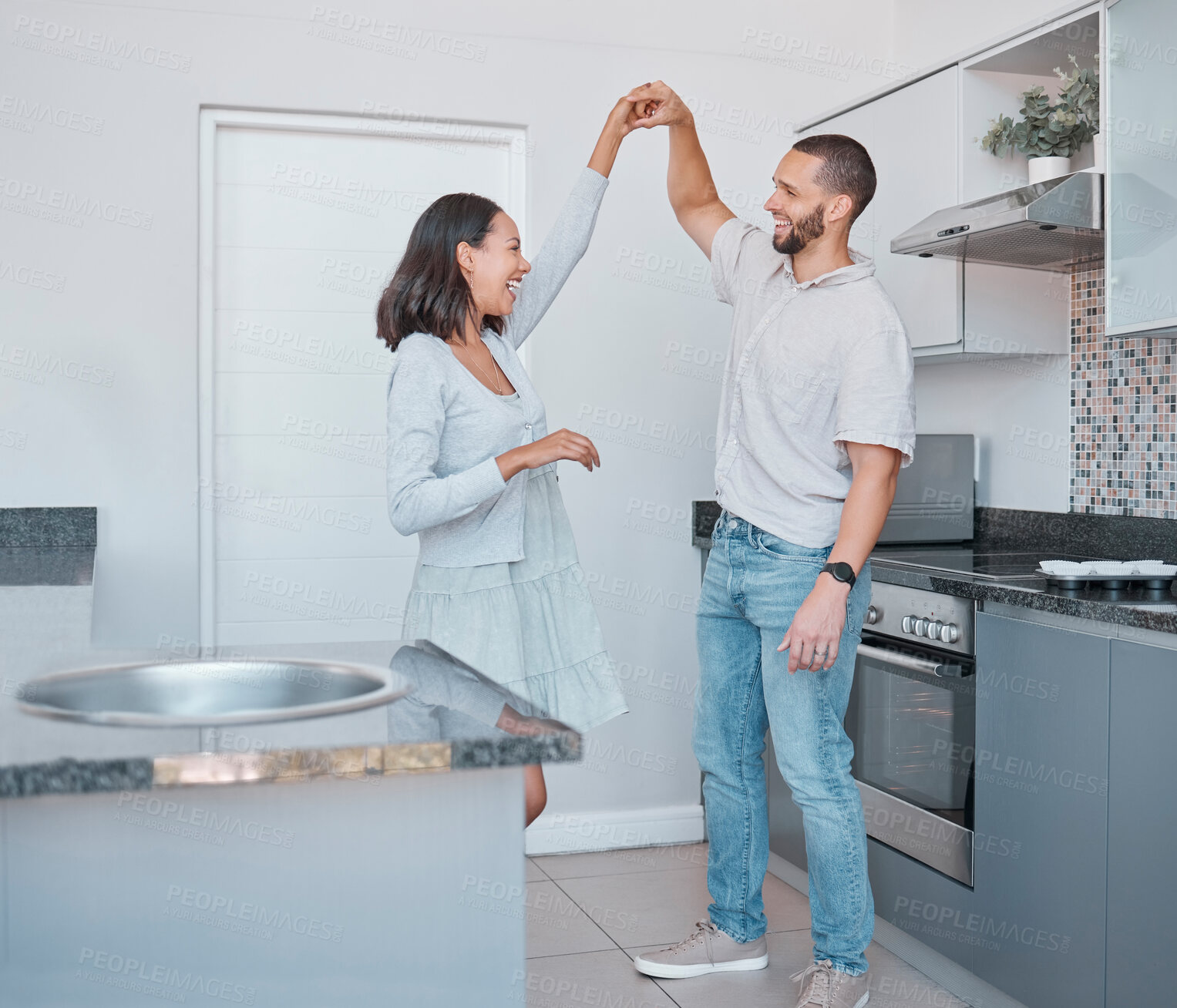Buy stock photo Romance, love and couple in the kitchen for a dance, happiness and smile in marriage. Quality time, happy and dancing man and woman with romantic energy to music in their apartment with care together