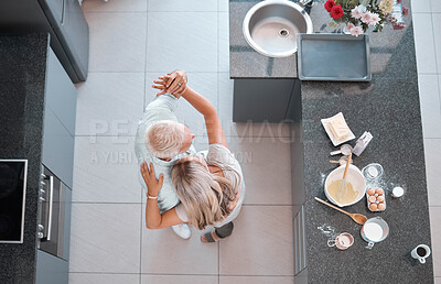 Buy stock photo Top view couple, dancing and home kitchen for cooking, happy romance or love bonding together. Senior man, woman dancer or dance movement on floor for steps, touch and retirement house with food