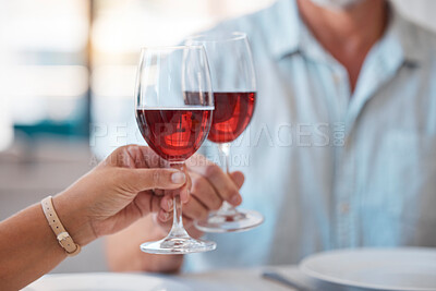 Buy stock photo Hands, wine glasses and cheers for celebration dinner, date or table in thanks for fine dining at home. Hand of couple toasting with wine for relationship, romance and clinking glass for dating love