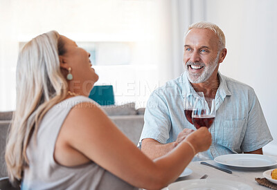 Buy stock photo Couple, wine and senior man and woman toast in anniversay celebration with a delicious meal in the family home. Red wine, love and husband and wife cheers for loving romantic relationship